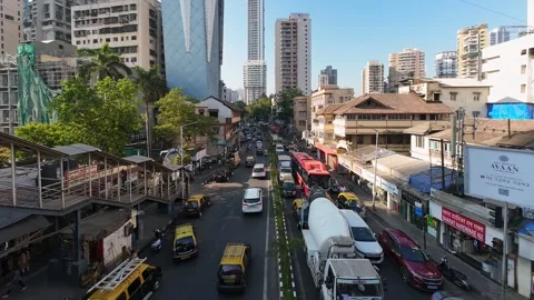 Time lapse motion video of busy traffic on Javji Dadaji Marg in Mumbai. Stock Footage 303659632