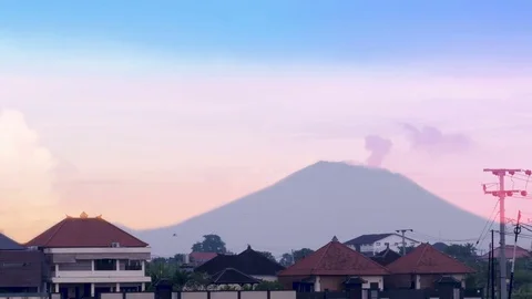 Time lapse of Mount Agung spewing ash and smoke from a volcano in Bali Stock Footage 84716258