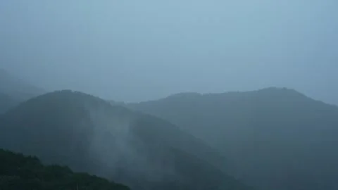 Time lapse of mountain cloud and rain Stock Footage 250778645
