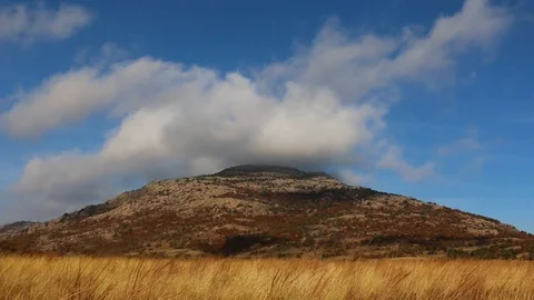 Time Lapse of Mountain with Clouds moving over peak 스톡 동영상 87701878