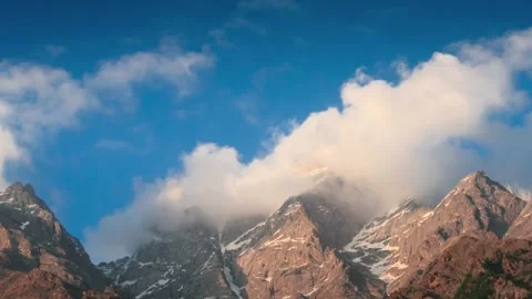 Time Lapse of Mountain Cloudscape in Majestic Display Stock Footage 319899337