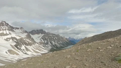 Time Lapse of Mountain Lake From Above, Rolling Clouds, 4K Stock Footage 200858549