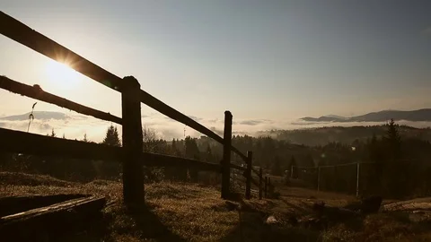 Time lapse a mountain landscape. Beautiful mountains hiding clouds. The sun 動画素材 78781309