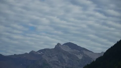 Time Lapse of Mountain Peak with Moving Clouds in the Swiss Alps 스톡 동영상 315497868