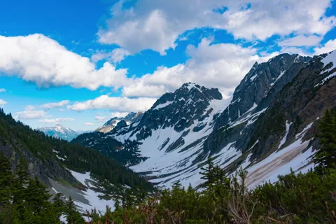 Time lapse mountain peaks in the North Cascades National Park from Cascade Pass Video stock 329464067