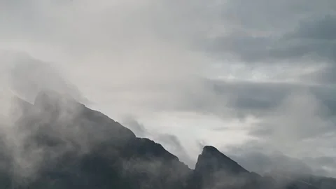 Time lapse of mountain peaks surrounded by clouds and mist, Banff Stock Footage 287037985