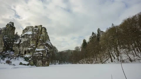 Time lapse of a mountain range in Germany. Winter with passing white clouds. Stock Footage 155709497