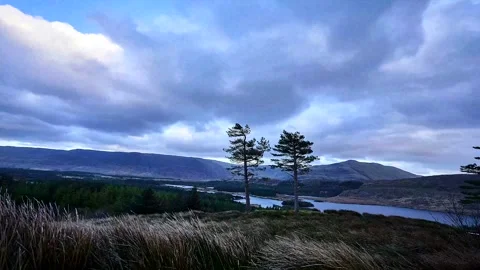 Time-lapse of mountains lake clouds landscape Stock Footage 277532691