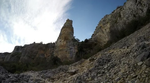 Time lapse in the mountains of lonely stands limestone cliff Stock Footage 48900695