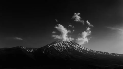 Time lapse of the movement of clouds above Damavand peak in Iran Stock Footage 246711781