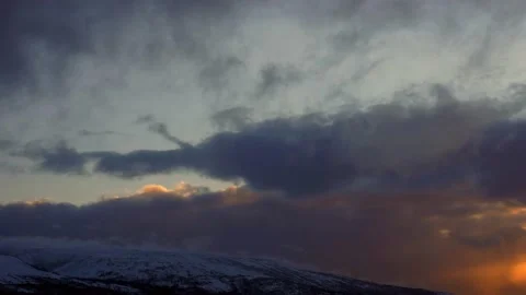 Time lapse movement of clouds and fog near the mountain at sunset Stock Footage 142500178