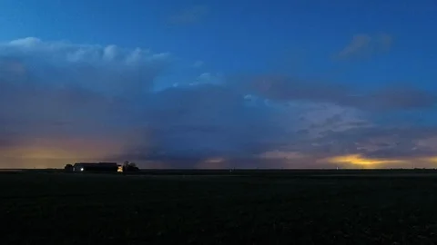 Time lapse of the movement of evening thunderstorms over the dutch countryside Stock Footage 115525823
