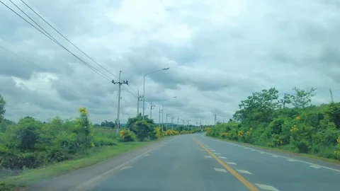 Time-lapse movement of fast driving along with the clouds in the sky moving quic 스톡 동영상 250221852