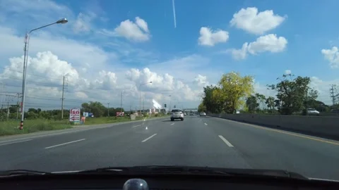 Time-lapse movement of fast driving along with the clouds in the sky moving quic 스톡 동영상 250221856