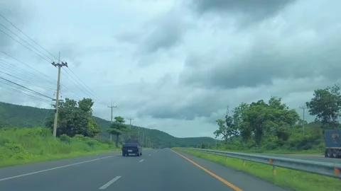 Time-lapse movement of fast driving along with the clouds in the sky moving quic Stock-Footage 250221875