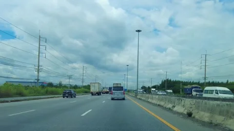 Time-lapse movement of fast driving along with the clouds in the sky moving quic 스톡 동영상 250222223