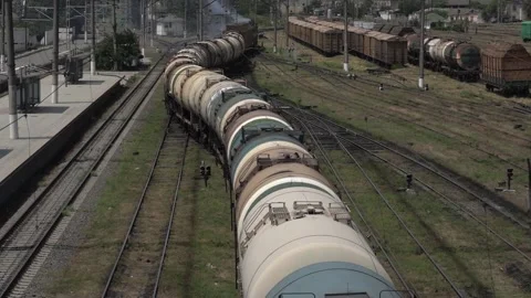 Time Lapse movement of a Train wagons loaded with Fuel Oil on Railway Tracks Stock Footage 237470671