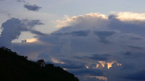 Time Lapse Movie of cloud movement over Mountain at Sunset. Stock Footage 51035559