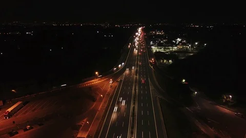 Time Lapse Moving - Aerial view of an Highway With Gas Station near the city at  Stock Footage 98568110