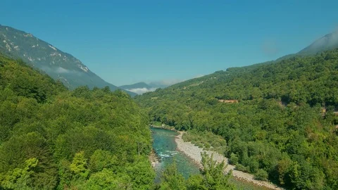 Time lapse with moving clouds above mountain river Stock Footage 69811413