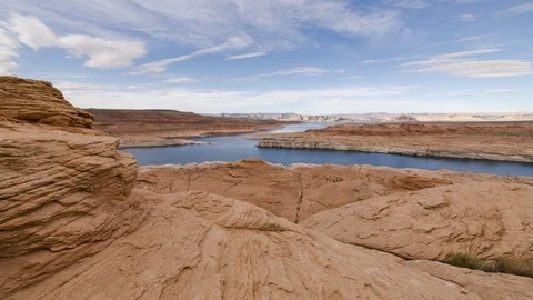 Time Lapse  - Moving clouds above the lake Powell in Arizona / Utah Stock Footage 99364511
