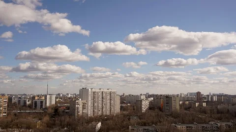 Time lapse of moving clouds above Moscow city. Cloud running across the blue sky Stock Footage 111343566