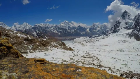 Time lapse of moving clouds above Gokyo Valley Stock Footage 125388332