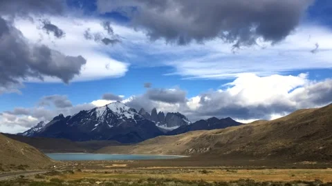 Time lapse of moving clouds above mountains and hills in the national park Stock Footage 264808346