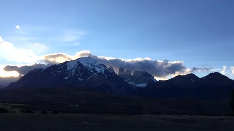 Time lapse of moving clouds above mountains and hills in the national park Video stock 264808405