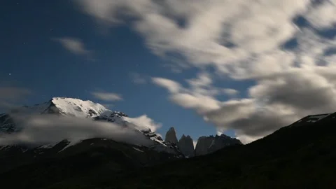 Time lapse of moving clouds above mountains on sunrise in the national park Stock Footage 275132502