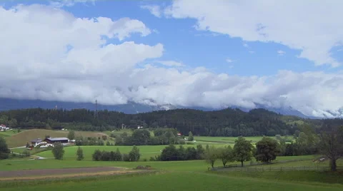 Time Lapse Moving Clouds in Alpine Village Stock Footage 52267878