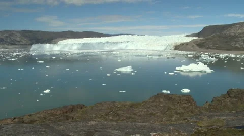 Time lapse of moving clouds and shadows on a glacier in Greenland Stock Footage 59998571