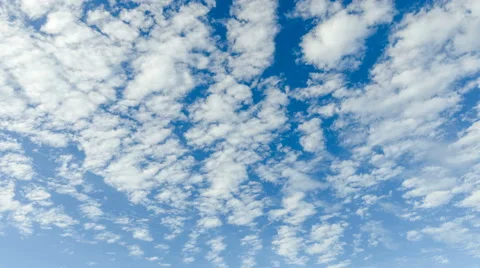 Time lapse - moving clouds and blue sky Stock Footage 64568708