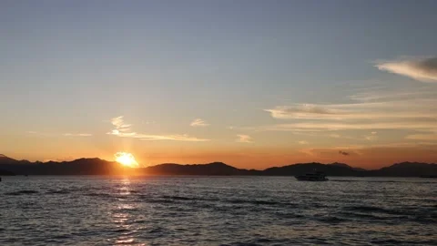 Time lapse of moving clouds and boats during sunset in Victoria Harbour. Hong Stock Footage 160603650