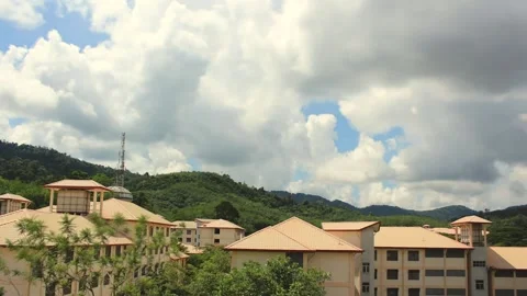 Time lapse of moving clouds area residency in the rural place. Stock Footage