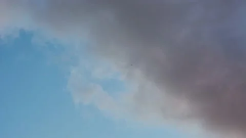 Time lapse of moving clouds on a blue sky. Stock Footage 150283129