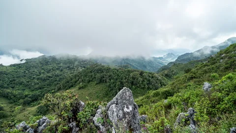 Time lapse of moving clouds during sunset at Don Luang Chiang Dao Stock Footage 258818500