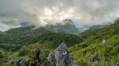 Time lapse of moving clouds during sunset at Don Luang Chiang Dao Stock Footage 258818537
