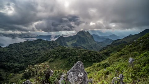 Time lapse of moving clouds during sunset at Don Luang Chiang Dao Stock Footage 258818609