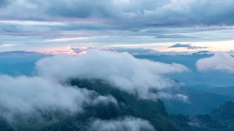 Time lapse of moving clouds during sunset at Don Luang Chiang Dao Stock Footage 258818629