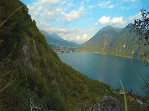 Time lapse of moving clouds with mountains and a beautiful lake Stock Footage 71948815
