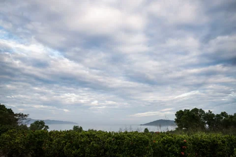 Time Lapse of Moving Clouds Over The Sea Video stock 36203890