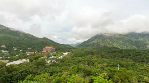 Time lapse of moving clouds over Po Lin Monastery in Ngong Ping in Hong Kong Stock Footage 39765703