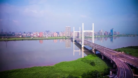 Time Lapse - Moving Clouds over a Bridge with traffic in Taipei, Taiwan Stock Footage 71170703