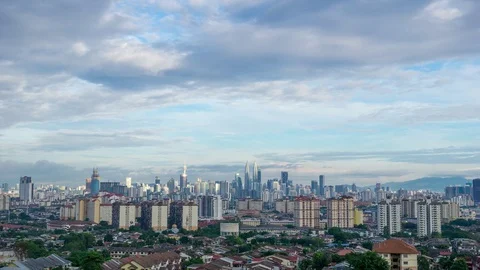 Time lapse of moving clouds over downtown Kuala Lumpur, Malaysia Stock Footage 78606766