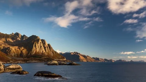 Time lapse - Moving clouds over the coastline of the Lofoten Видео 81613574