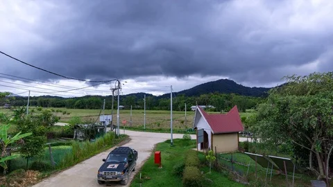 Time lapse of moving clouds over paddy fields at Bario, Sarawak, Malaysia Stock Footage 86006496