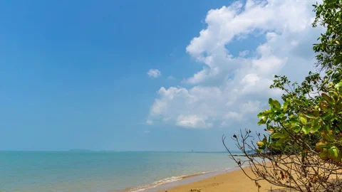 Time lapse of moving clouds over beautiful tropical beach in remote island Stock Footage 87631555