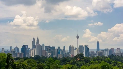 Time lapse of moving clouds over downtown Kuala Lumpur, Malaysia Stock Footage 87632559