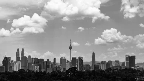 Time lapse of moving clouds over downtown Kuala Lumpur, Malaysia Stock Footage 87634215